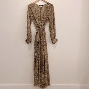 Animal print dress 100% polyester. Size S